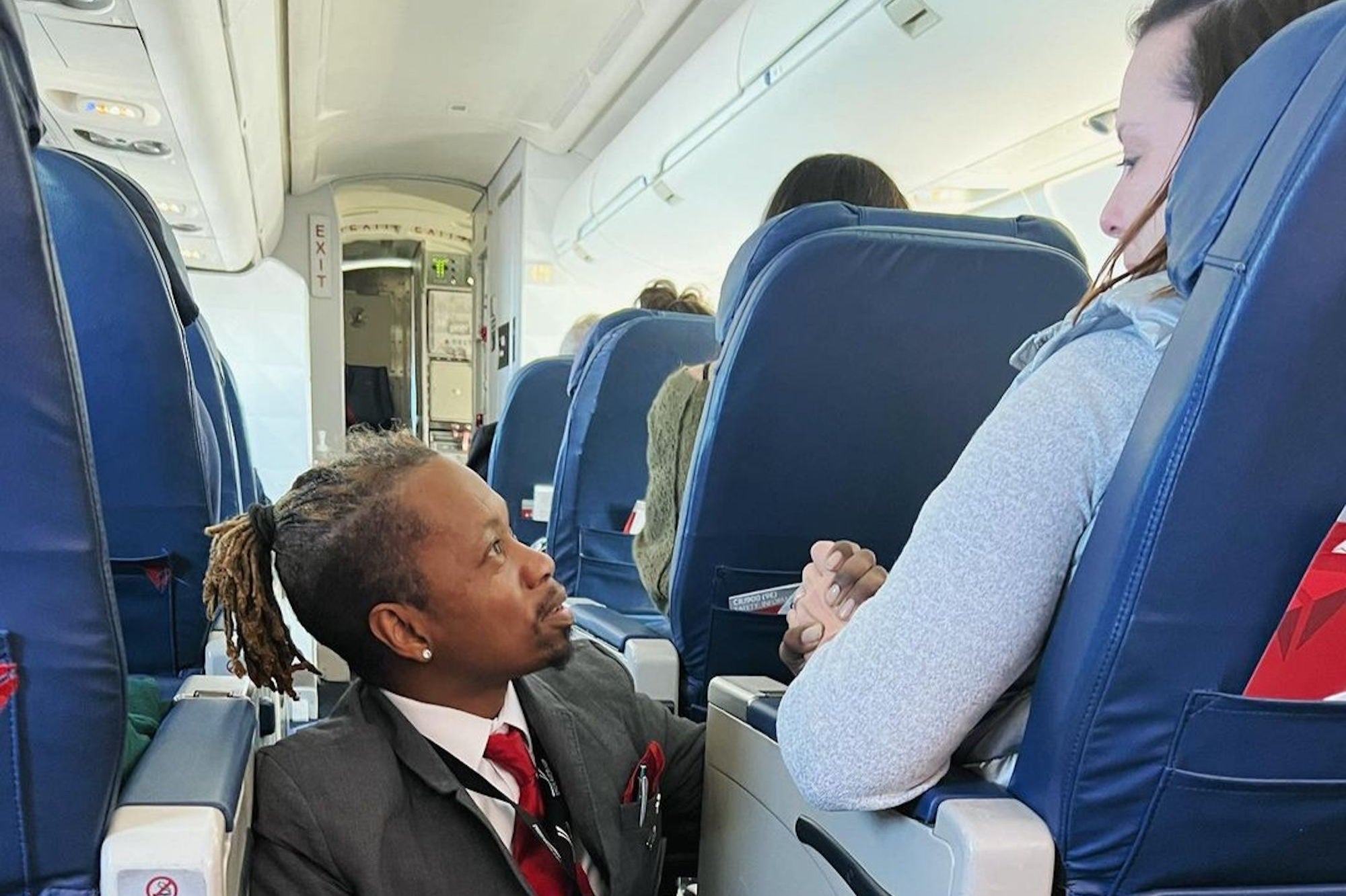 'The Most Lovable Moment of 2023': Delta Flight Attendant Charms Internet By Helping Nervous Passenger