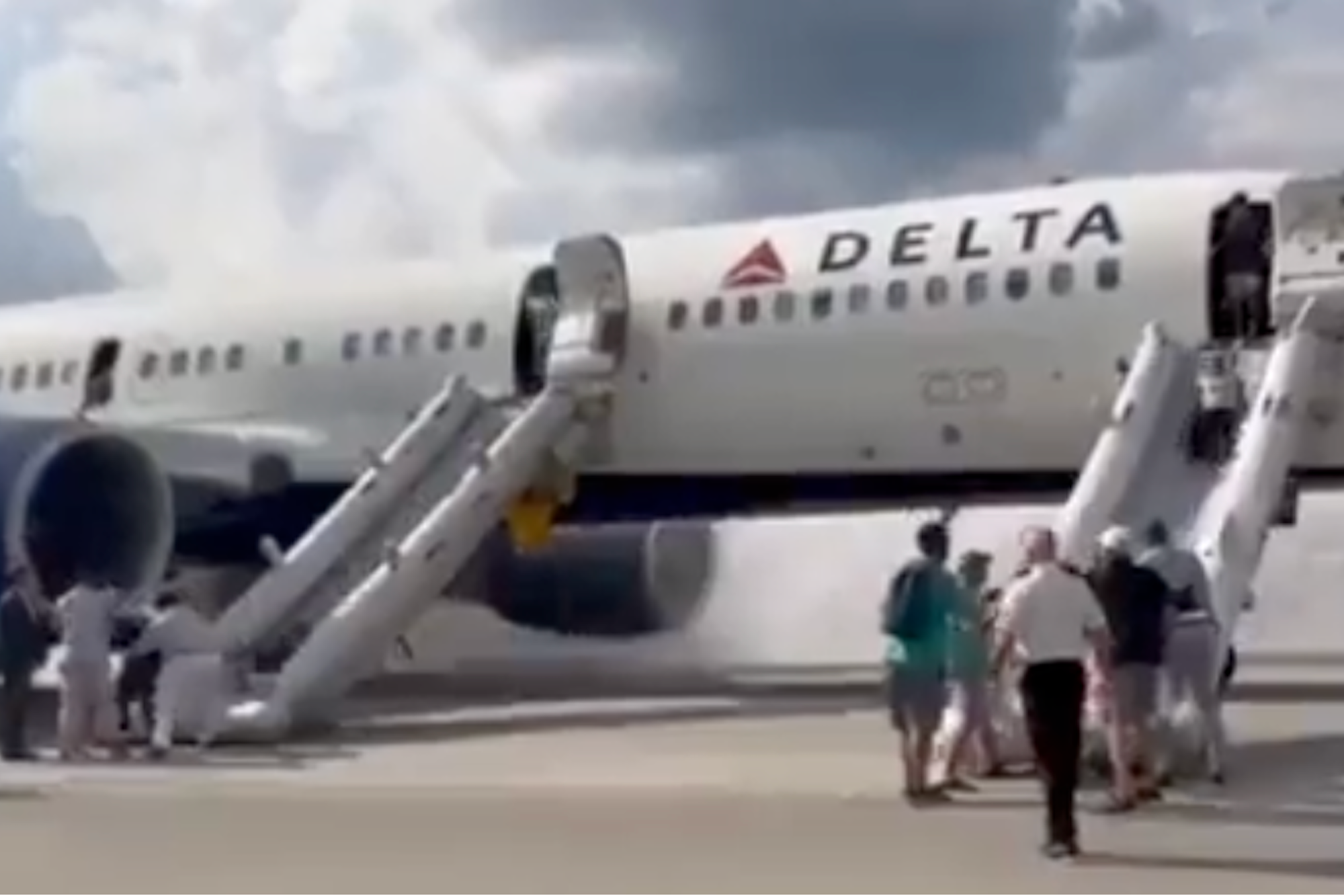 Watch: Passengers Evacuate Delta Airlines Plane After Tire Pops During Landing, One Injured
