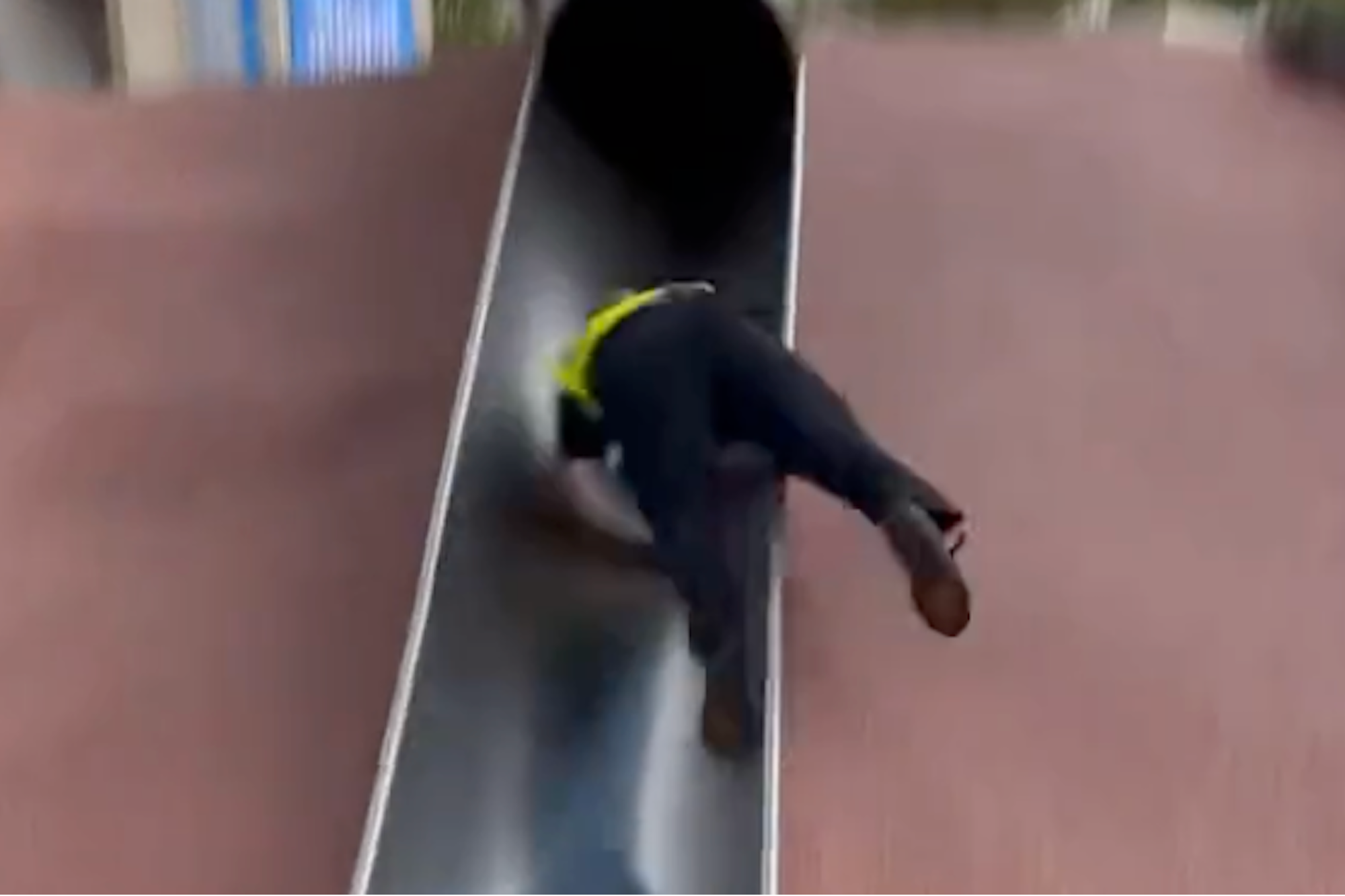 Watch: Boston Police Officer Gets Wrecked After Riding Children's Slide In City Hall Plaza