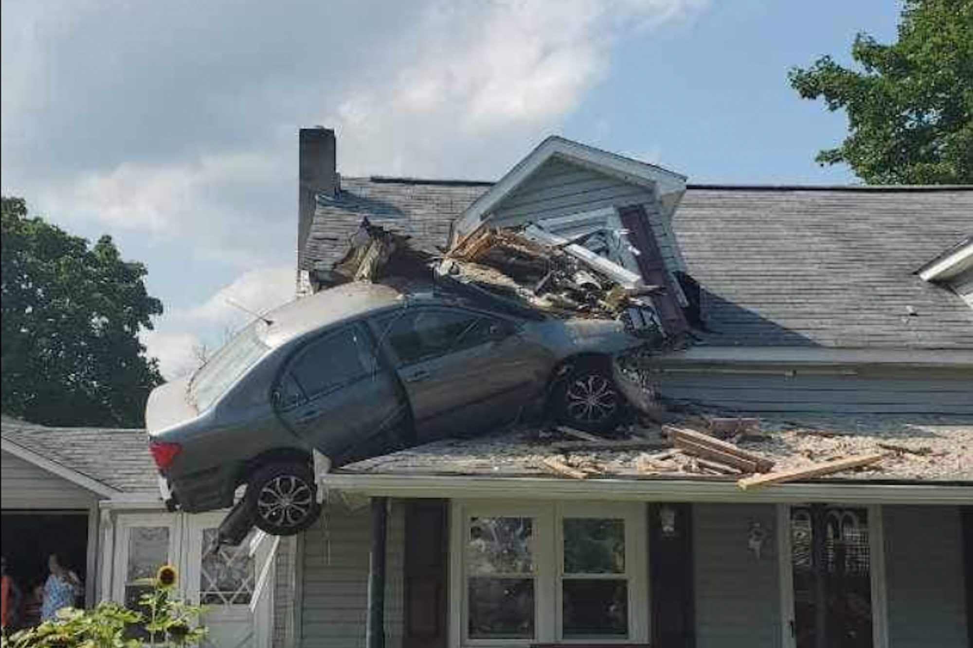 Car Crashes Into Second Story of Pennsylvania Home, Lodges Into Roof in Harrowing Photos