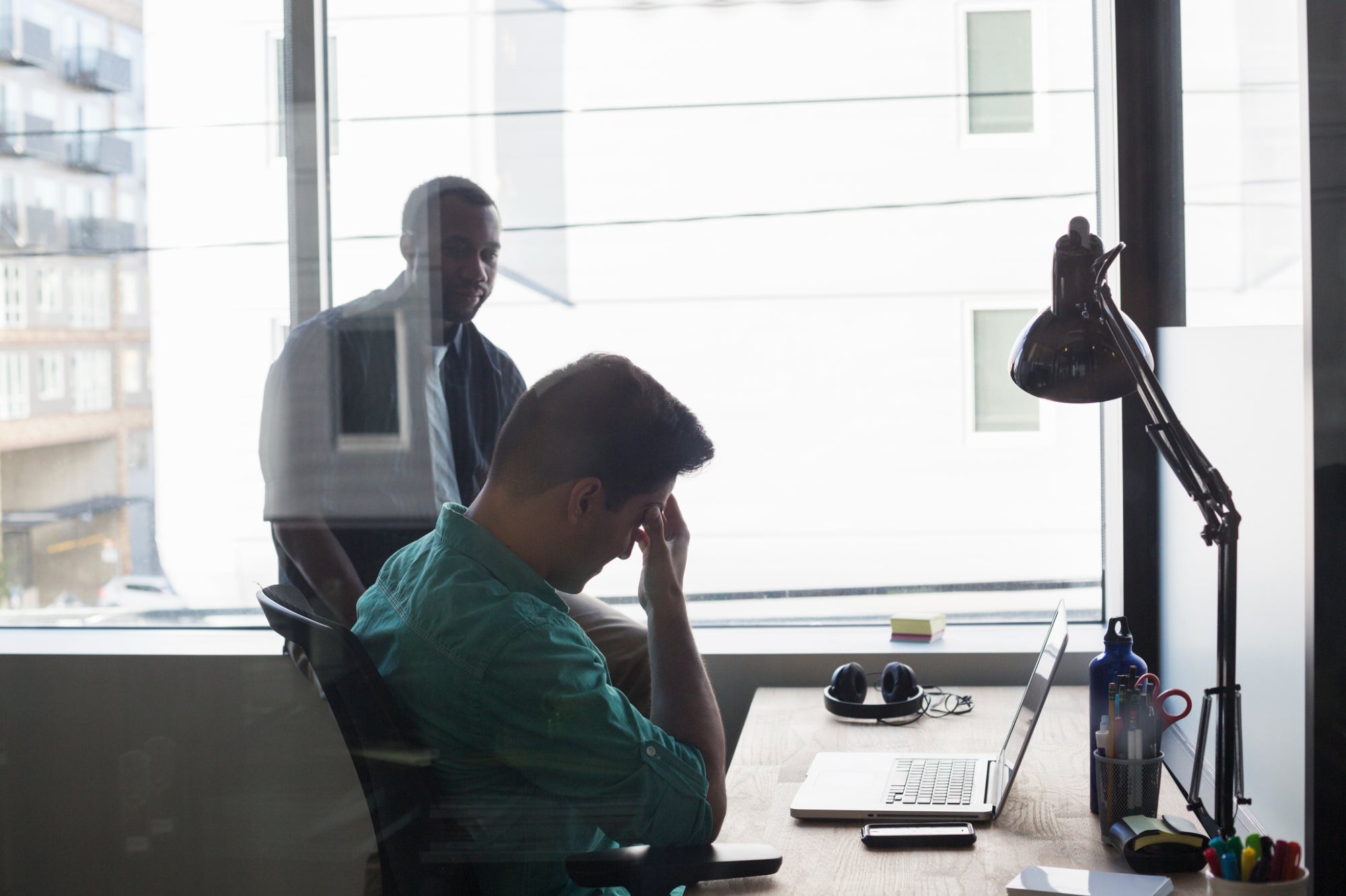 Concerned About a Coworker's Burnout? Here's How to Approach the Topic Safely and Tactfully