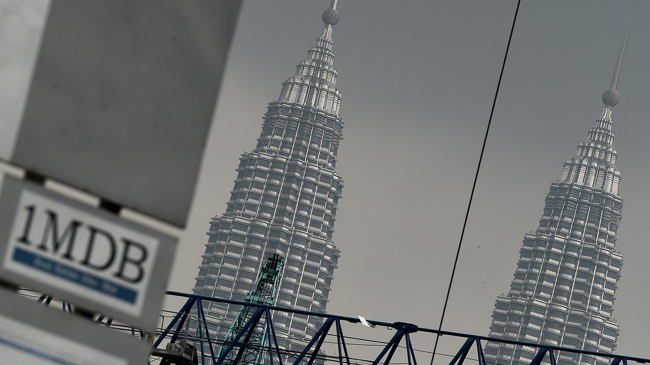 The Wall Street Journal: 2 ex-Goldman bankers indicted by Justice Dept. in Malaysian 1MDB scandal