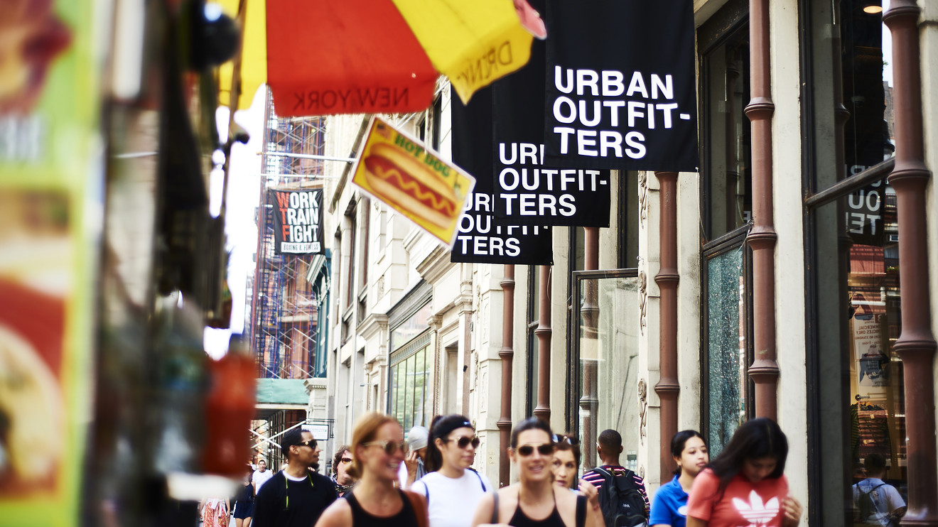 Credit.com: Credit card defaults are down, but debt levels are on the rise